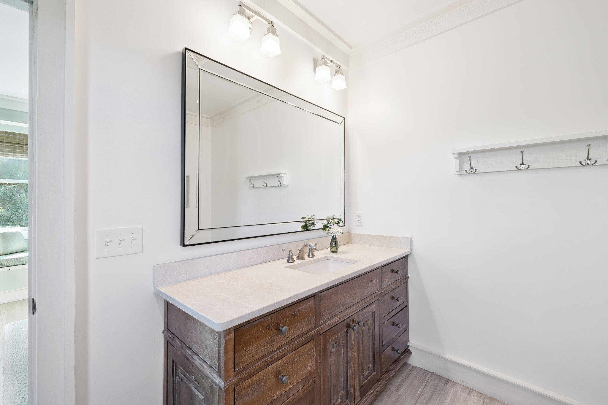 425 Beachfront Trail Santa Rosa Beach, FL 32459 - Photo 40 of 117 a bathroom with a sink and a mirror