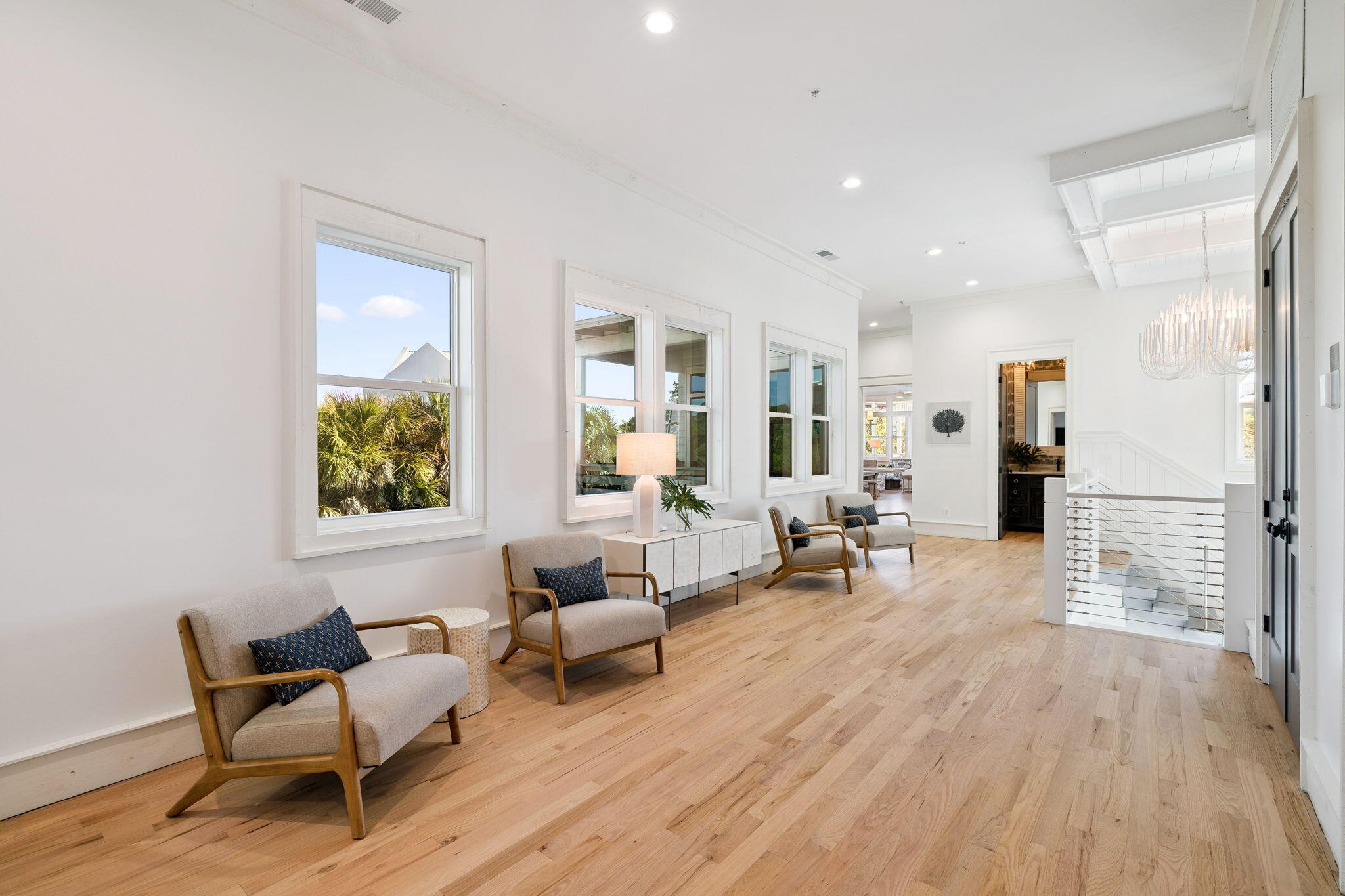 425 Beachfront Trail Santa Rosa Beach, FL 32459 - Photo 44 of 117 a living room with furniture and wooden floor