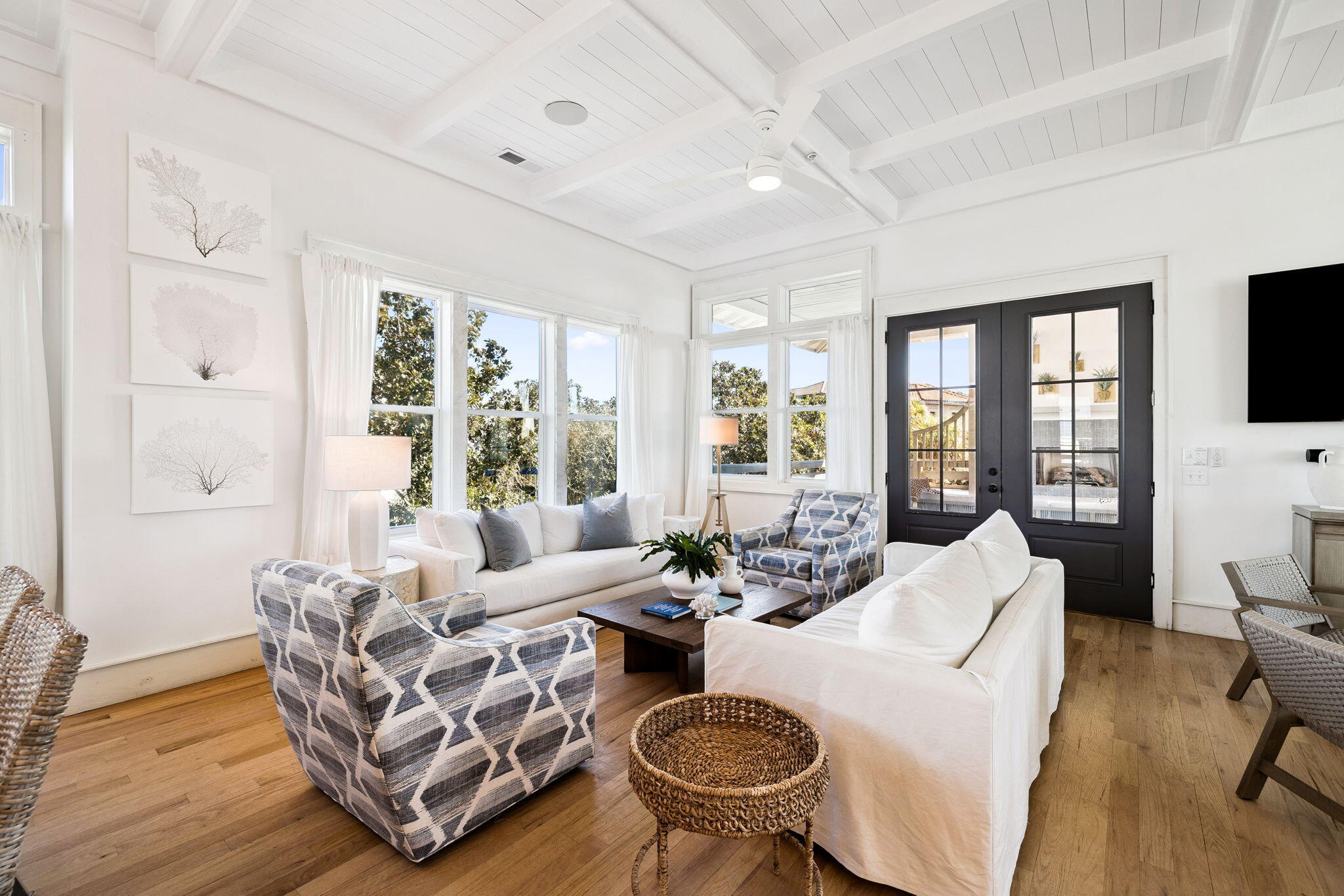 425 Beachfront Trail Santa Rosa Beach, FL 32459 - Photo 58 of 117 a living room with furniture and a flat screen tv