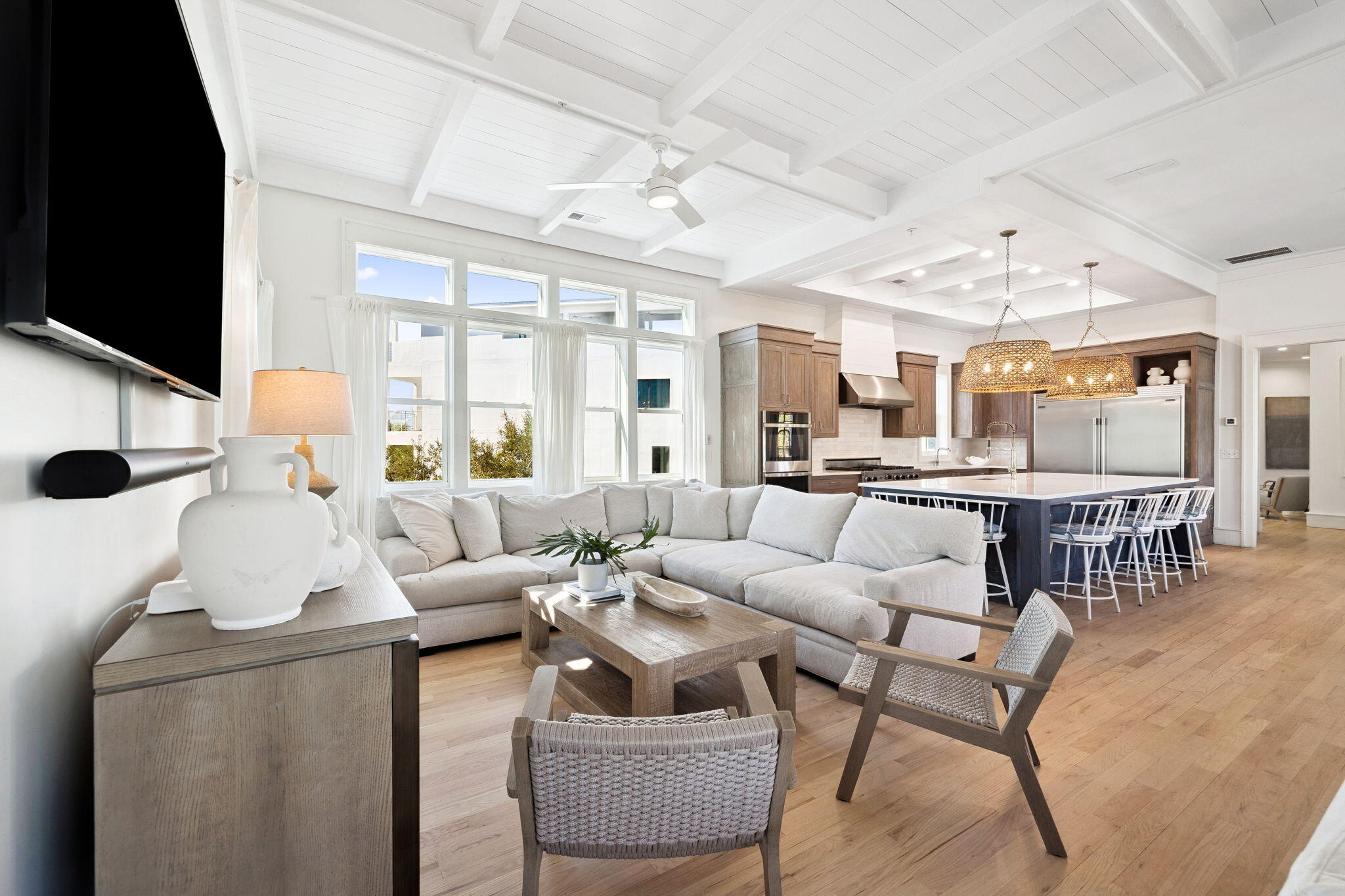 425 Beachfront Trail Santa Rosa Beach, FL 32459 - Photo 59 of 117 a living room with furniture and a flat screen tv