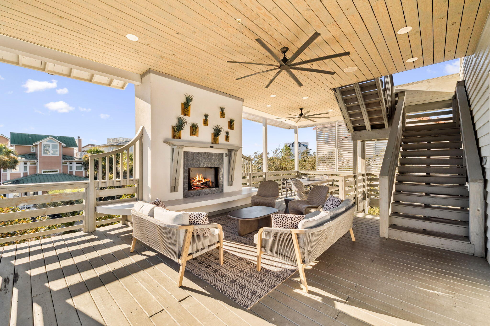 425 Beachfront Trail Santa Rosa Beach, FL 32459 - Photo 61 of 117 a living room with furniture and a fireplace