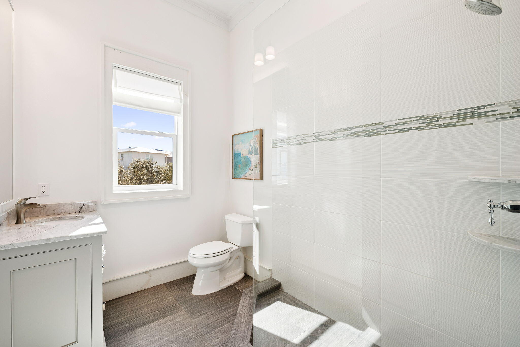 425 Beachfront Trail Santa Rosa Beach, FL 32459 - Photo 72 of 117 a bathroom with a toilet a sink and a window