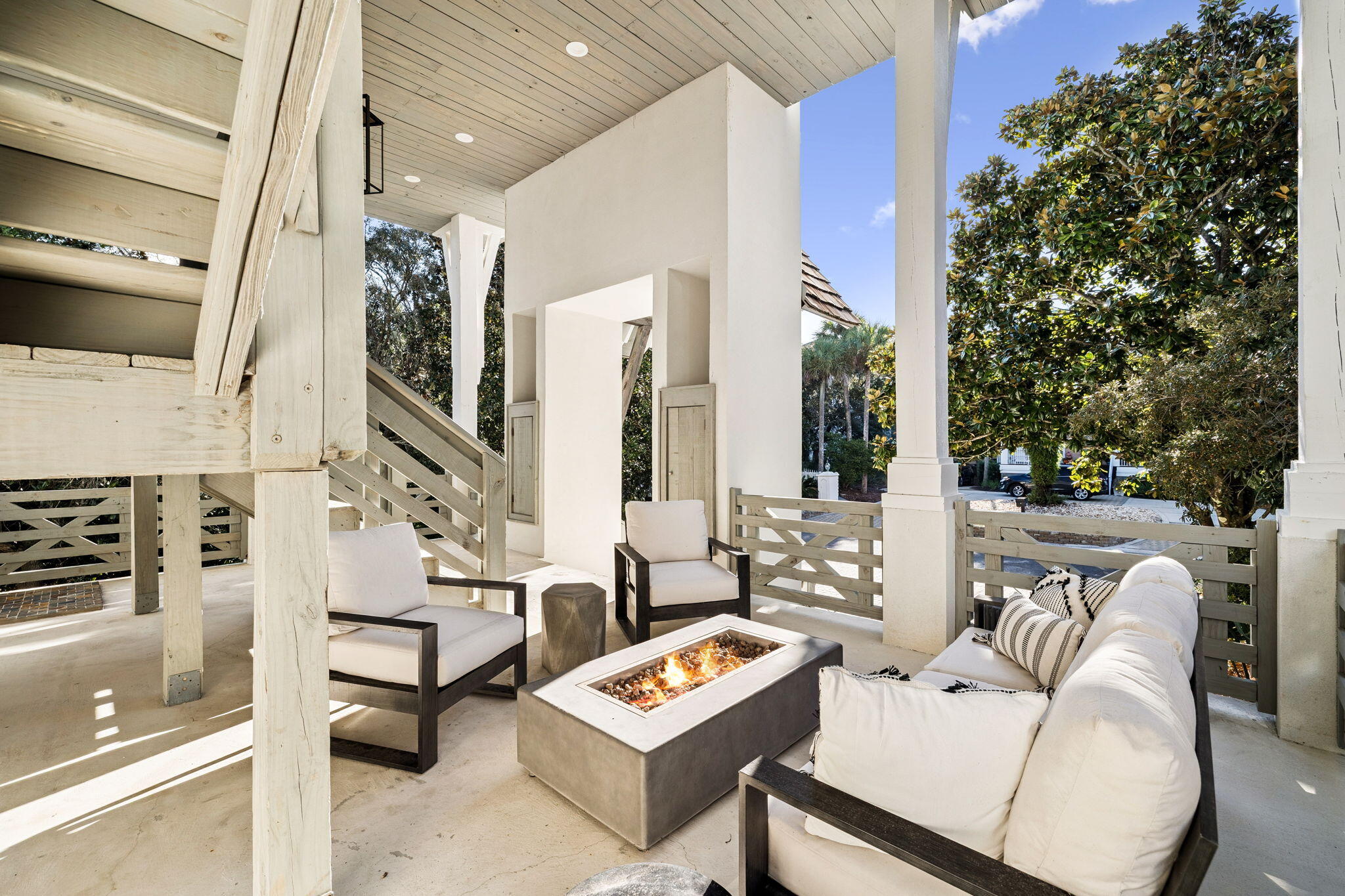 425 Beachfront Trail Santa Rosa Beach, FL 32459 - Photo 10 of 117 a outdoor living space with furniture and a potted plant