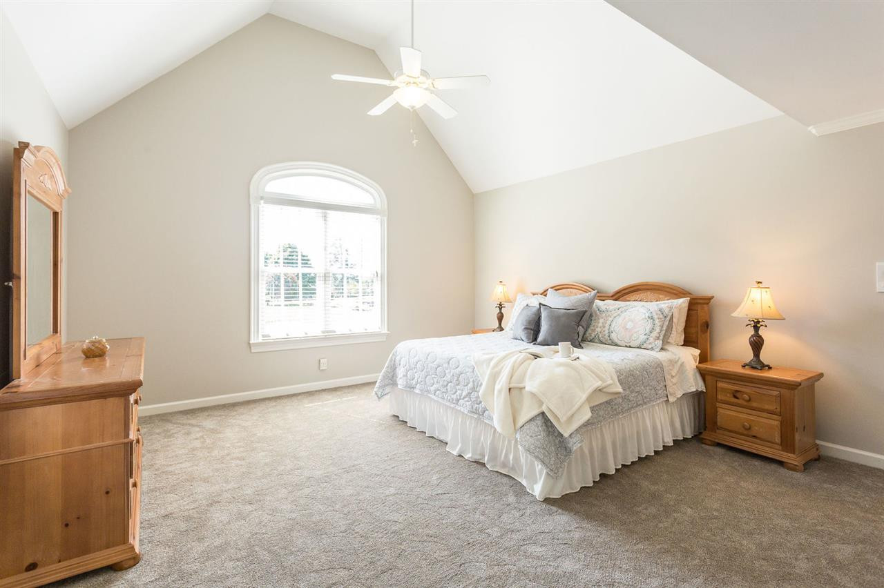 12404 Bayleaf Church Road Raleigh, NC 27614 - Photo 15 of 25 Second Master or guest suite! This room faces west and boasts a large bath with double sinks, tub/shower and walk-in closet. (There are TWO more bedrooms on the second floor!) Second floor Master/Guest Suite