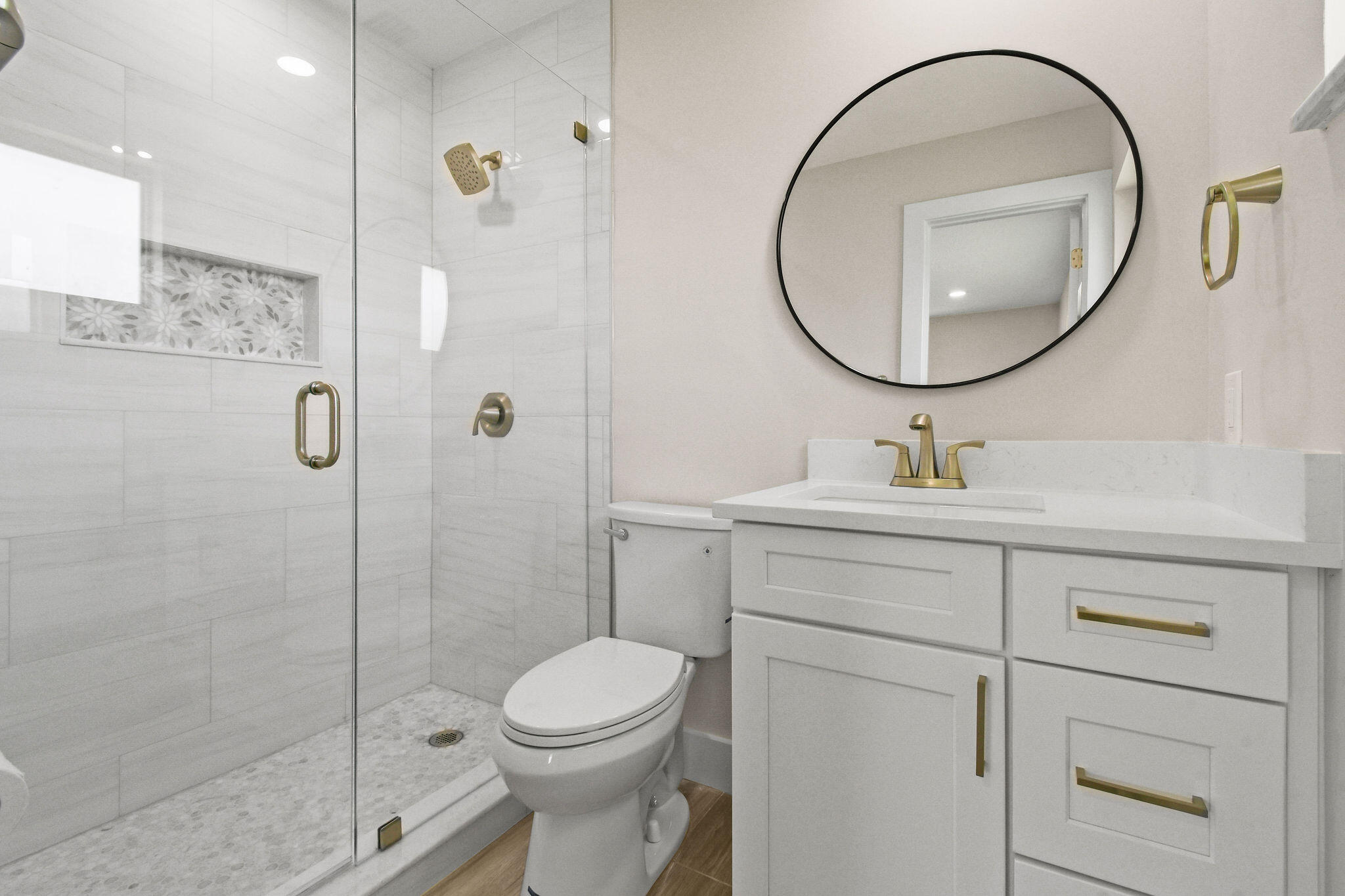 1522 Lance Road Jupiter, FL 33469 - Photo 24 of 50 a bathroom with a sink a toilet and a mirror