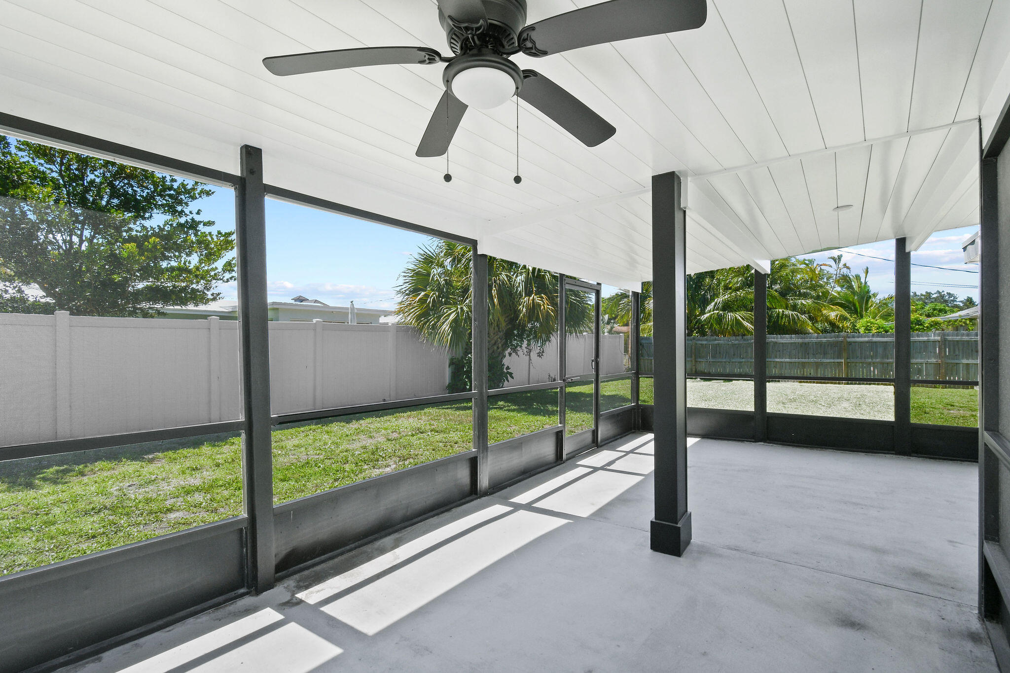 1522 Lance Road Jupiter, FL 33469 - Photo 40 of 50 a view of an room with a floor to ceiling window