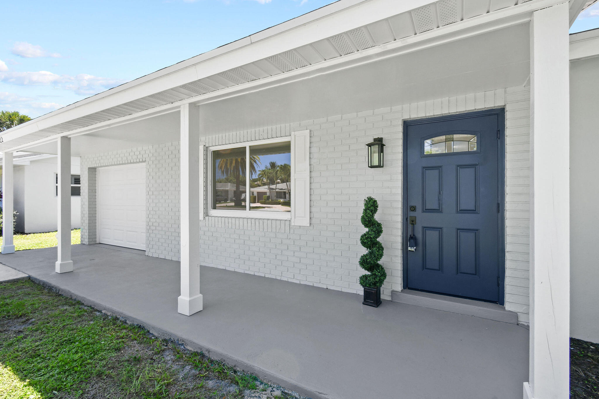 1522 Lance Road Jupiter, FL 33469 - Photo 5 of 50 a view of empty room with front door