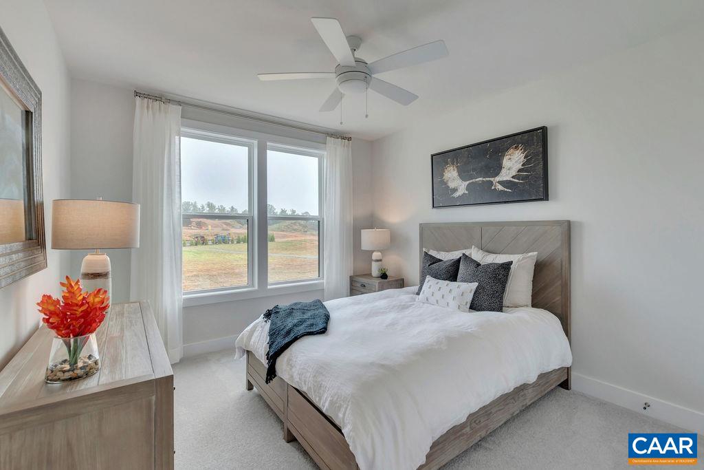 809 Wesley Lane, Unit A Charlottesville, VA 22911 - Photo 14 of 18 a bedroom with bed and window