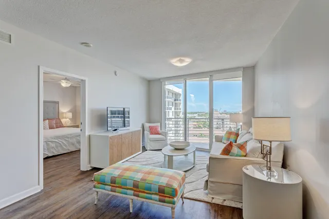 a living room with furniture and a table