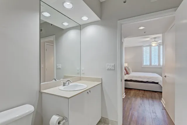 a en suite bathroom with a sink and a mirror