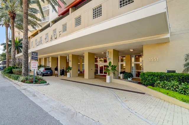 a view of a building with sitting area