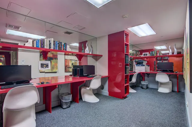 a room with musical instruments and air hockey table