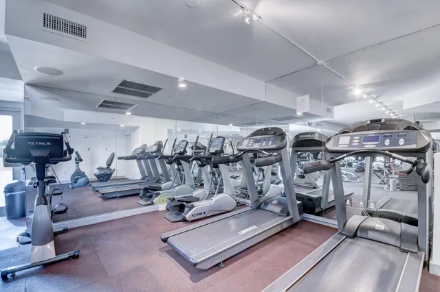 a bathroom with a sink and shower