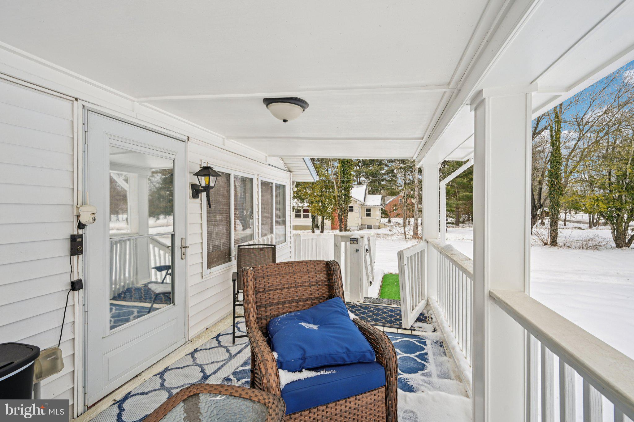 1340 South Orchard Road Vineland, NJ 08360 - Photo 12 of 42 a living room with furniture and a floor to ceiling window