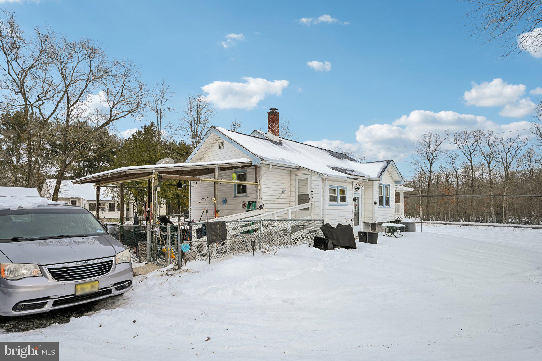 1340 South Orchard Road Vineland, NJ 08360 - Photo 5 of 42 a car parked in front of house