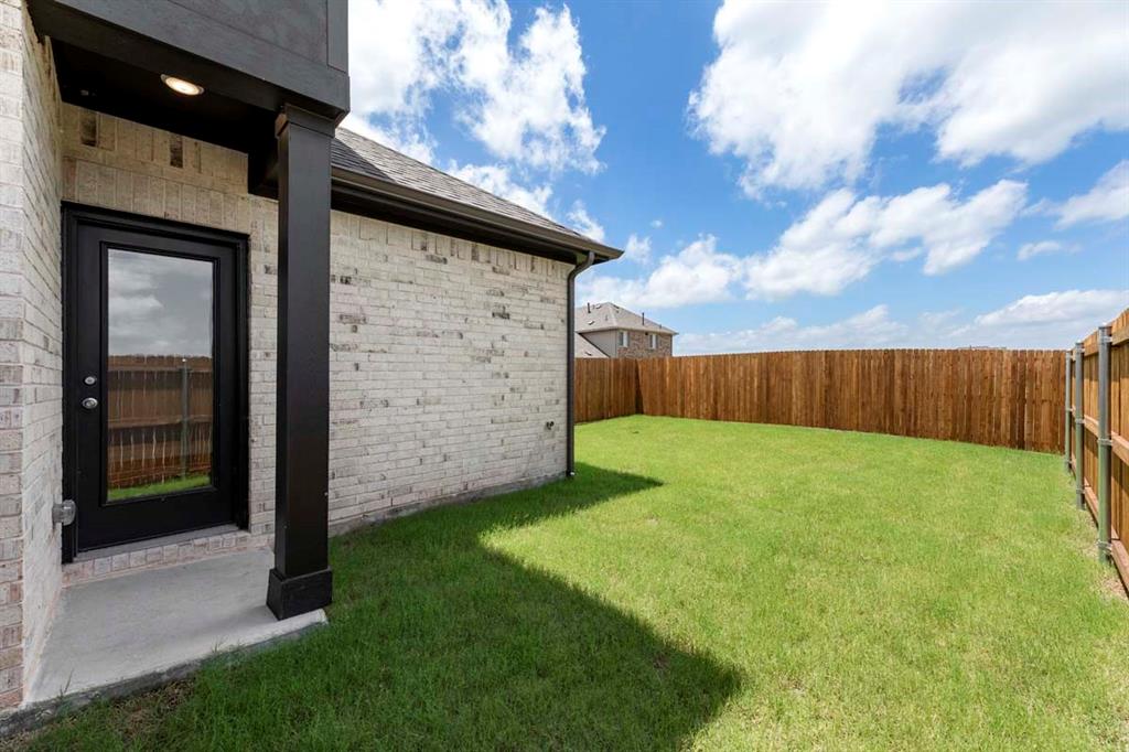 451 Sweet Spring Drive Lavon, TX 75166 - Photo 21 of 33 21-451-sweet-spring-lavon-tx-patio-backyard
