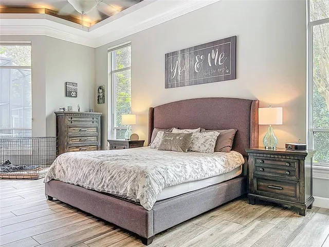 a room with open cabinet and mirrors