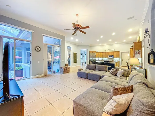 a living room with furniture and a window
