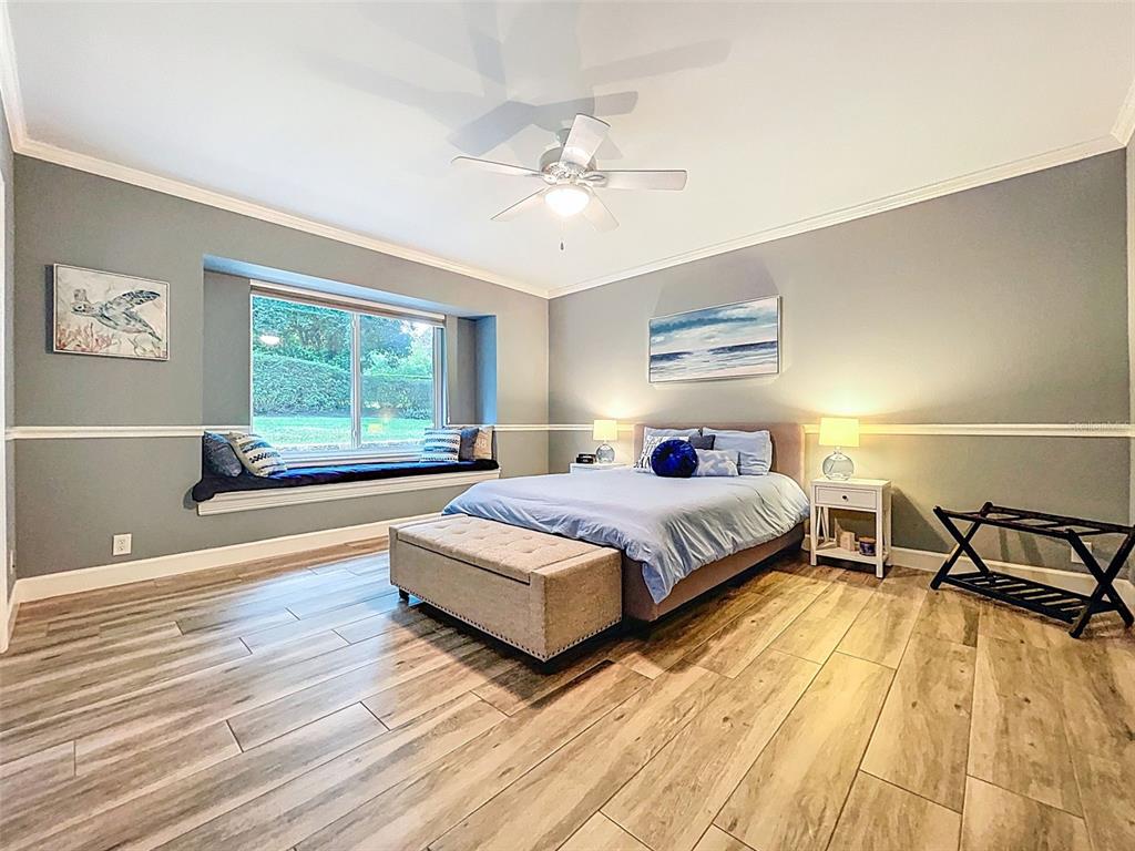 414 Westgate Road Tarpon Springs, FL 34688 - Photo 35 of 75 a bedroom with a bed and window