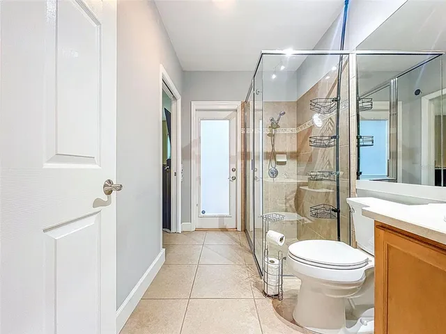 a view of a backyard with sitting area