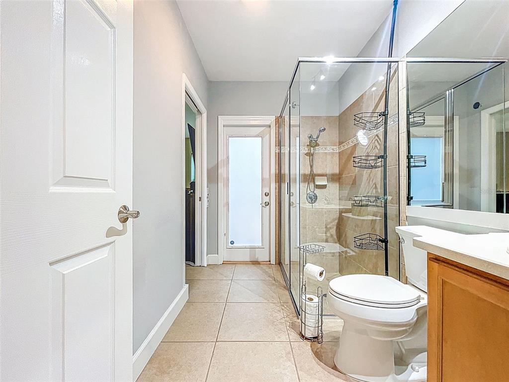 414 Westgate Road Tarpon Springs, FL 34688 - Photo 40 of 75 a bathroom with a toilet and a shower