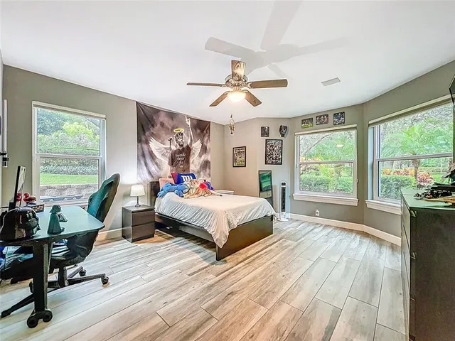 a view of a playground with basketball court
