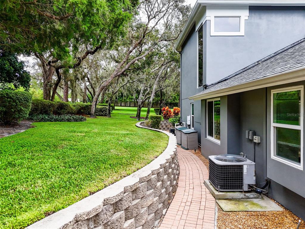 414 Westgate Road Tarpon Springs, FL 34688 - Photo 60 of 75 a view of a backyard with sitting area