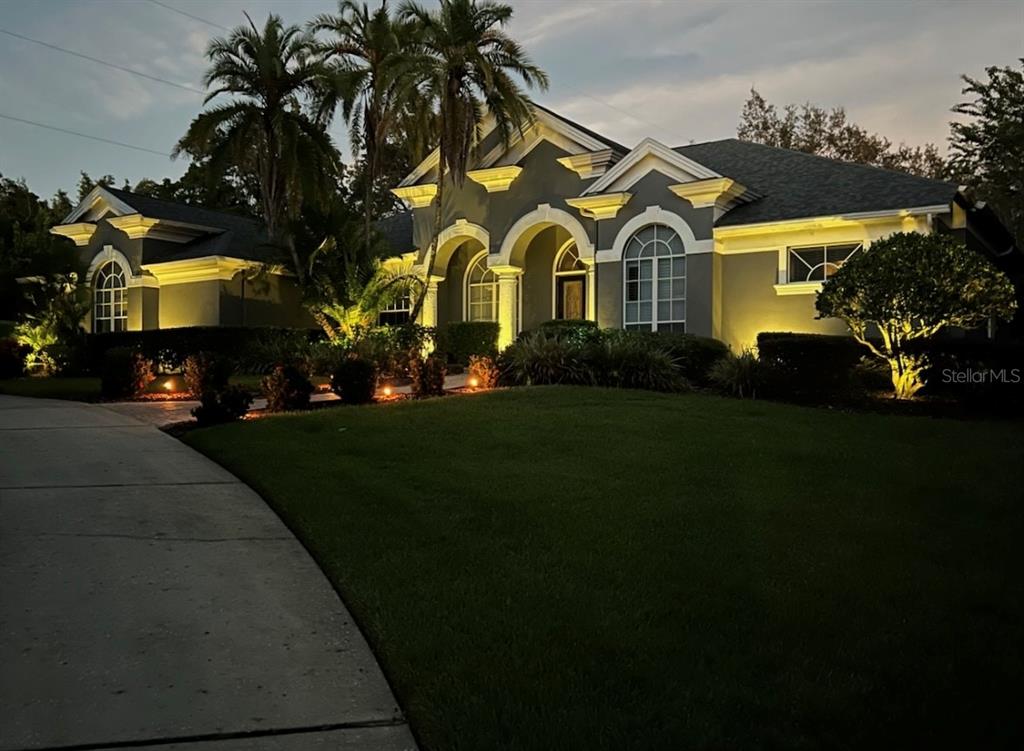 414 Westgate Road Tarpon Springs, FL 34688 - Photo 72 of 75 a view of multiple houses with a yard