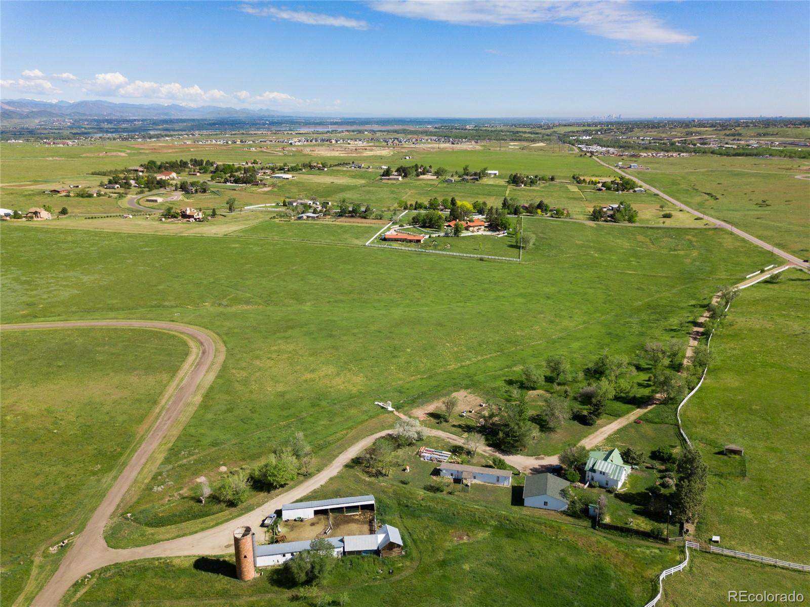 8045 North Moore Road Littleton, CO 80125 - Photo 13 of 17 an aerial view of a houses with a yard