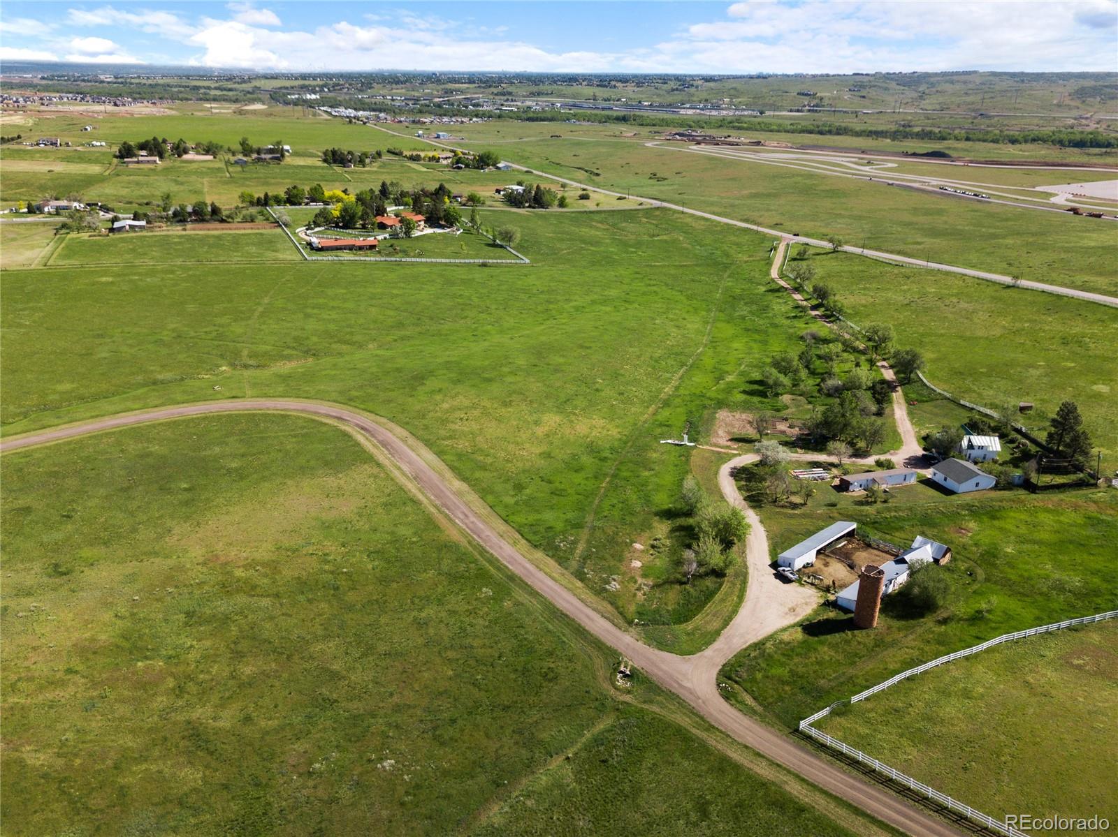 8045 North Moore Road Littleton, CO 80125 - Photo 14 of 17 a view of a lake with a city