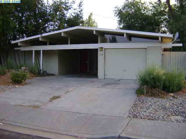 4125 Phoenix Street Concord, CA 94521 - Photo 1 of 1 a front view of a house with garden