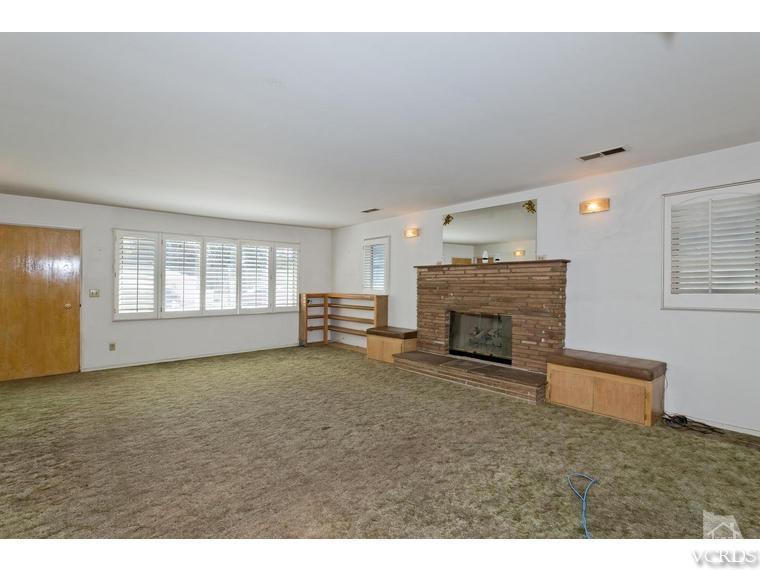 4361 Adam Road Simi Valley, CA 93063 - Photo 5 of 12 a view of empty room with a fireplace