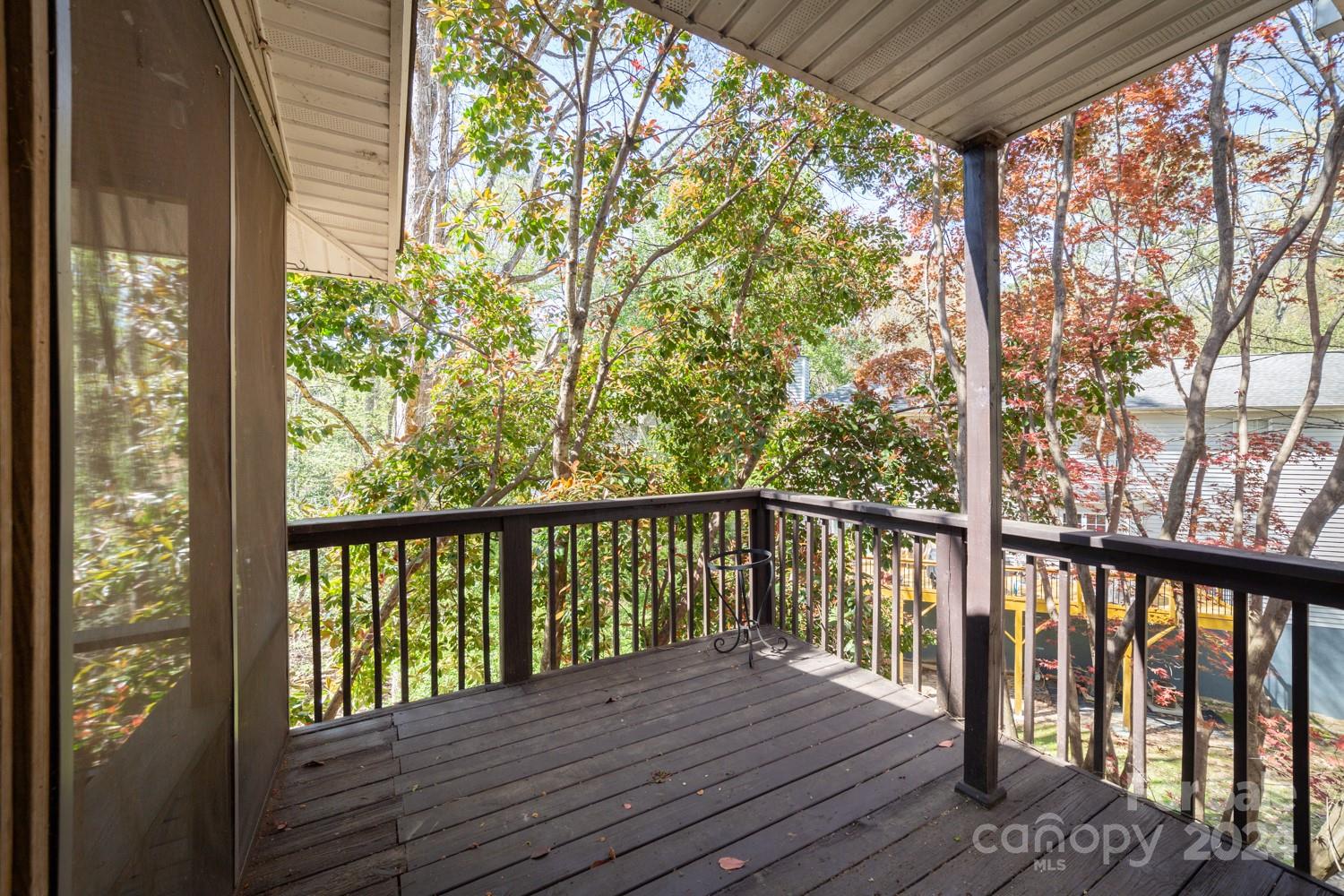 1177 Molokai Drive Tega Cay, SC 29708 - Photo 28 of 41 a view of balcony with wooden floor and fence
