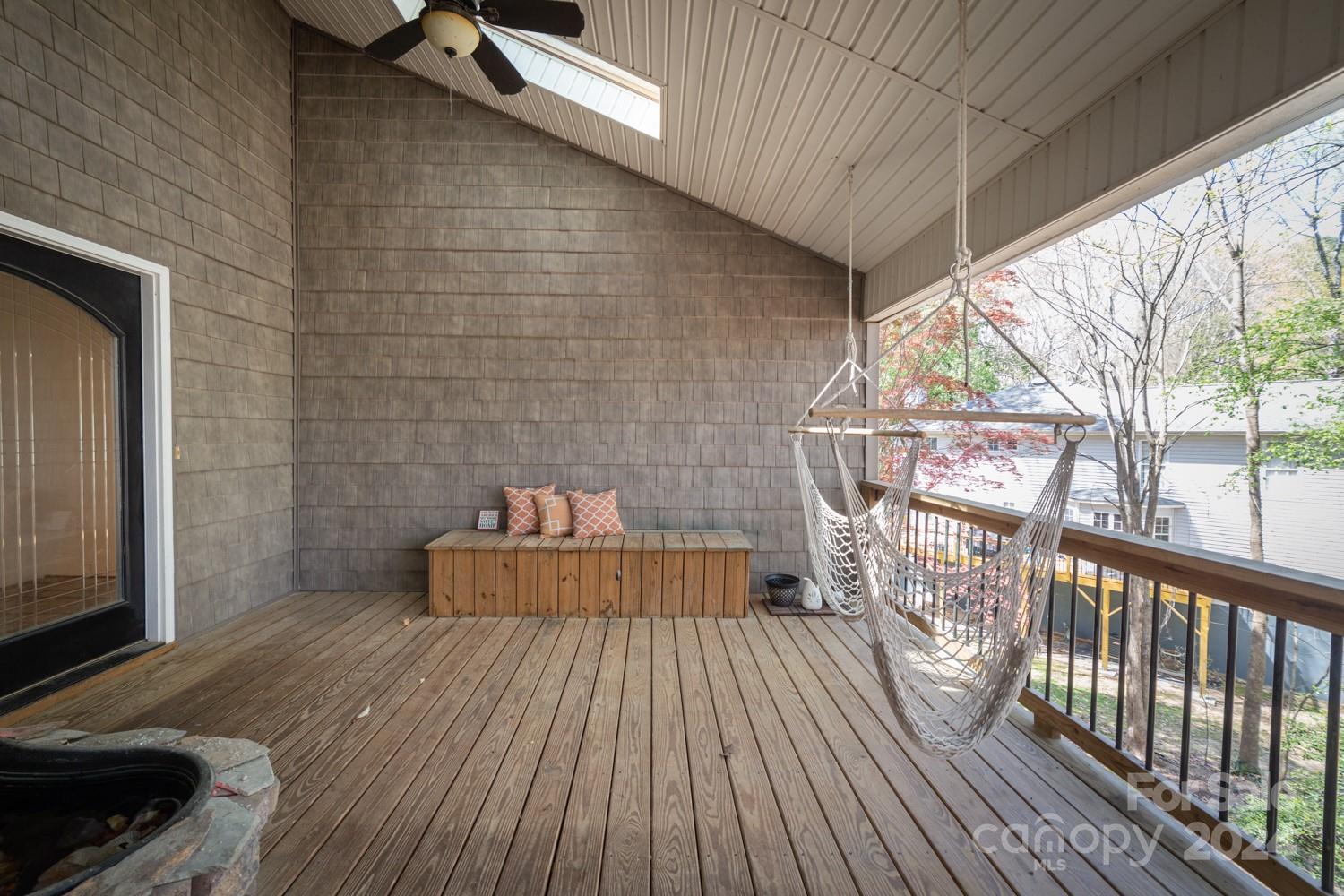 1177 Molokai Drive Tega Cay, SC 29708 - Photo 32 of 41 a view of balcony with wooden floor and outdoor seating