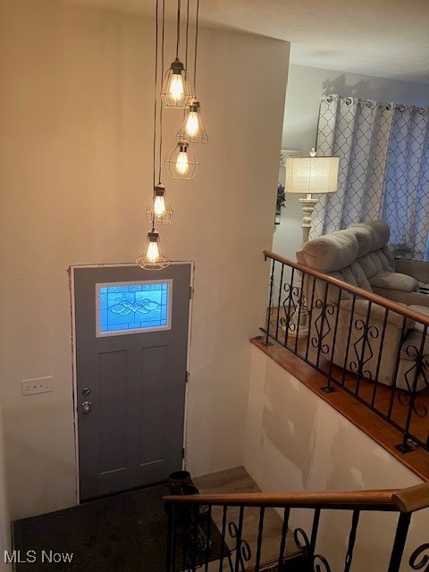 14495 Peckham Road Burton, OH 44021 - Photo 6 of 24 Foyer entrance with stairs