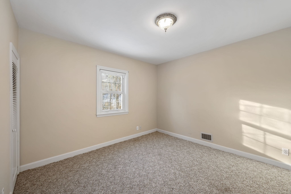 216 Boston Road Southborough, MA 01772 - Photo 12 of 30 an empty room with a window