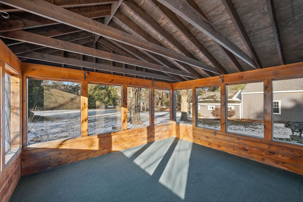 216 Boston Road Southborough, MA 01772 - Photo 15 of 30 a view of an empty room with wooden floor and a next to a window