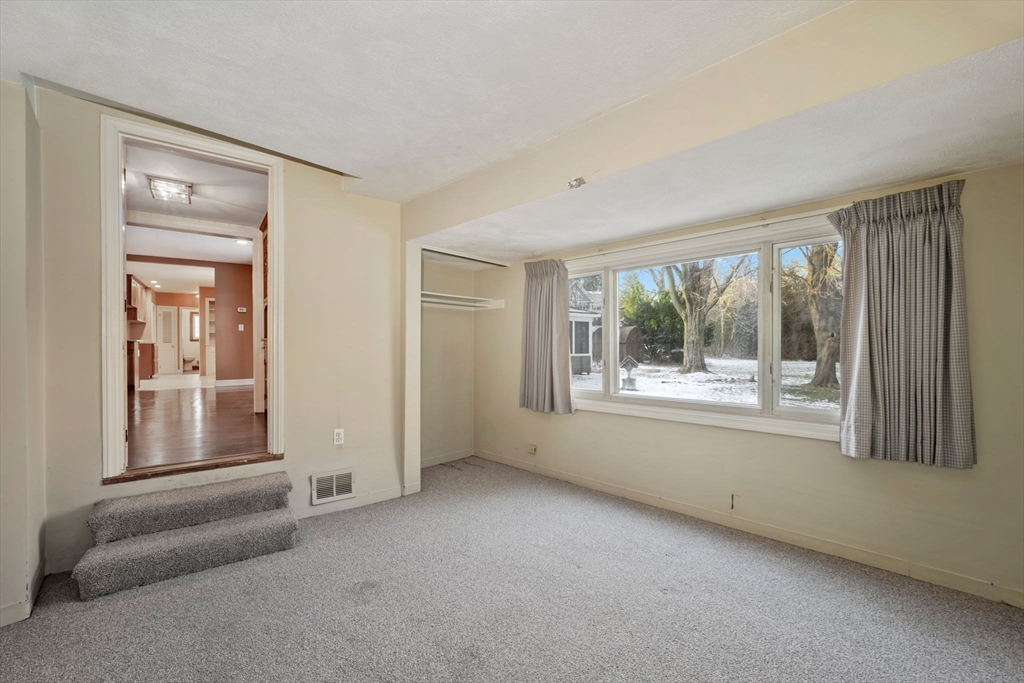 216 Boston Road Southborough, MA 01772 - Photo 19 of 30 a view of an empty room with a window