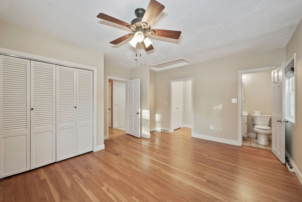 216 Boston Road Southborough, MA 01772 - Photo 10 of 30 a view of an empty room with wooden floor