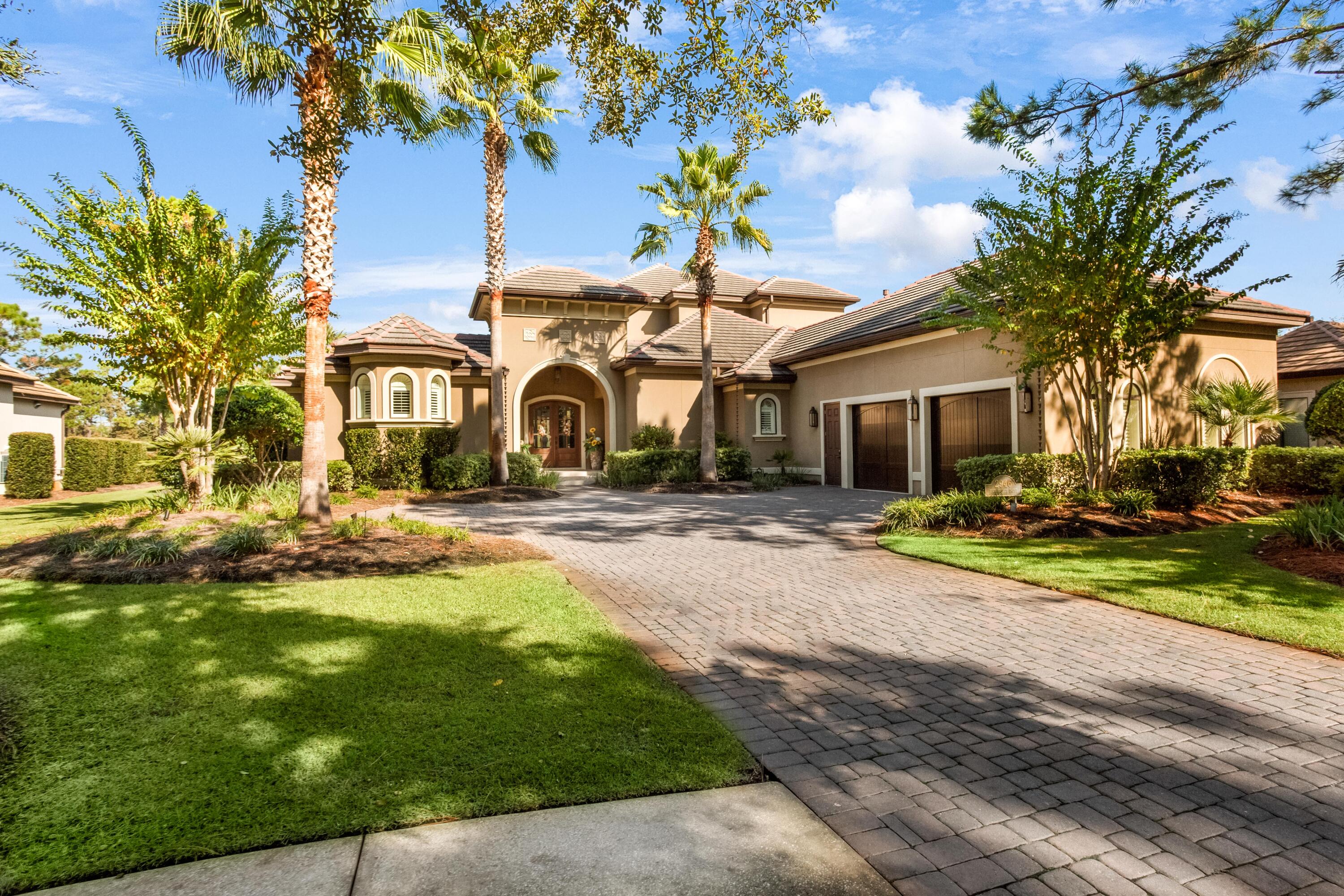 2946 Pine Valley Road Miramar Beach, FL 32550 - Photo 1 of 52 a front view of a house with a yard