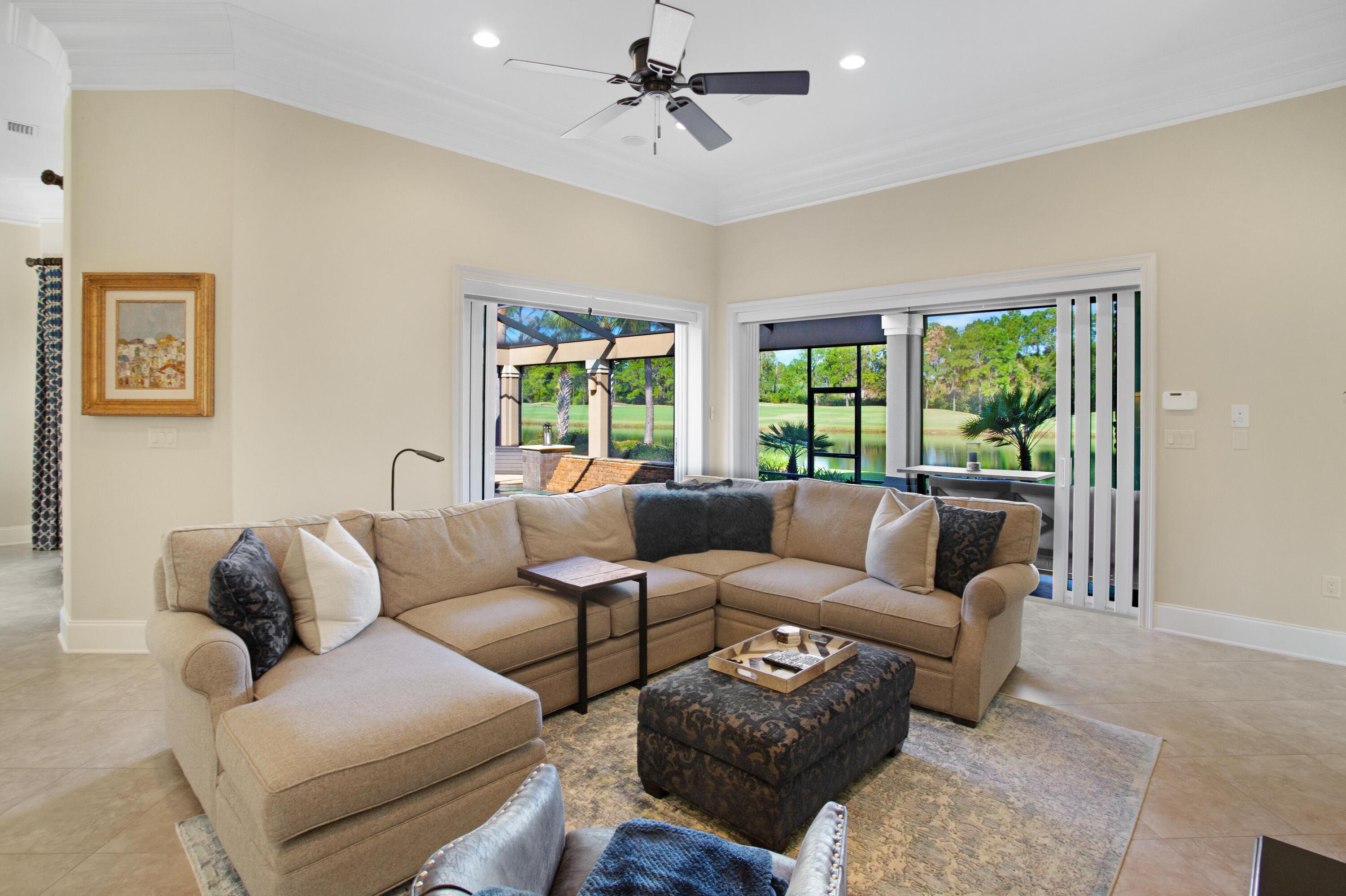 2946 Pine Valley Road Miramar Beach, FL 32550 - Photo 12 of 52 a living room with furniture and a large window