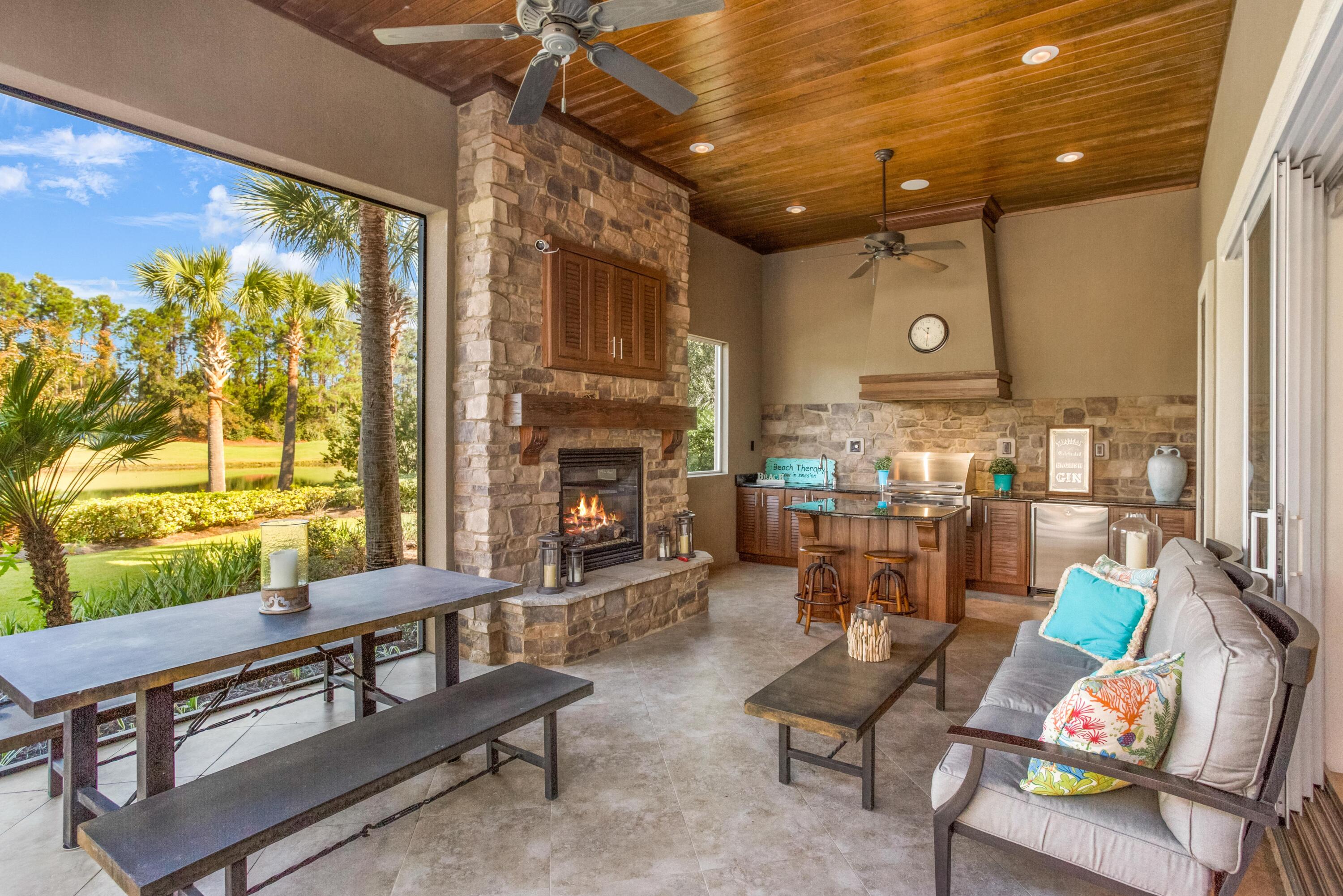 2946 Pine Valley Road Miramar Beach, FL 32550 - Photo 29 of 52 a living room with furniture and a fireplace