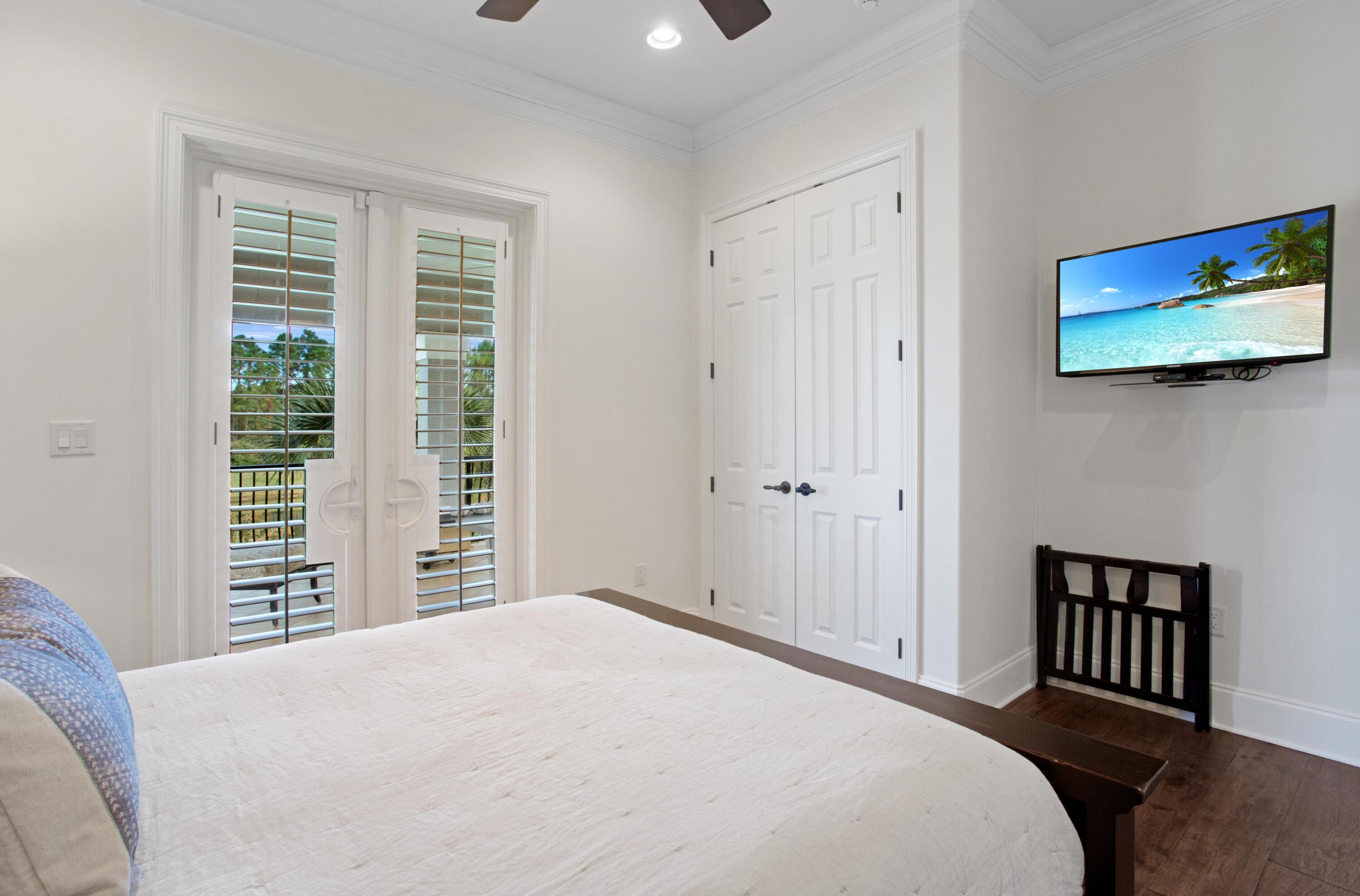 2946 Pine Valley Road Miramar Beach, FL 32550 - Photo 34 of 52 a bedroom with a bed and a window