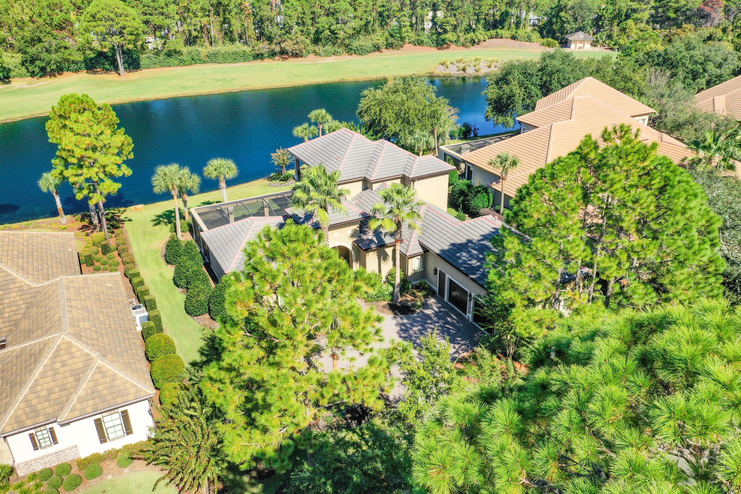 2946 Pine Valley Road Miramar Beach, FL 32550 - Photo 48 of 52 an aerial view of a house with a yard and lake view