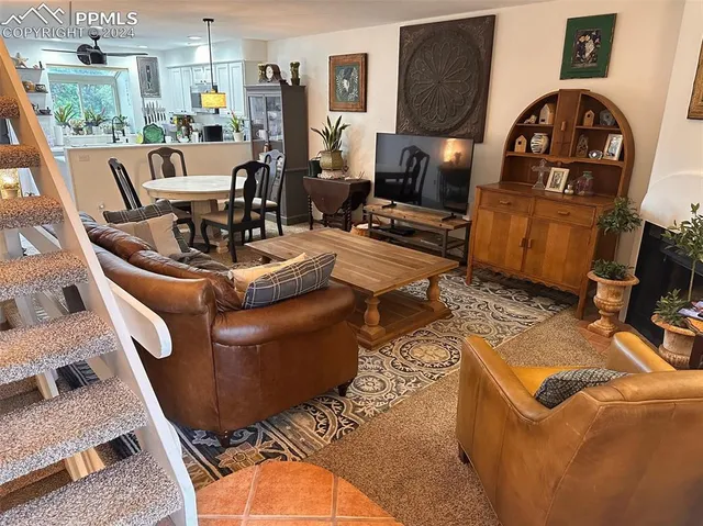 a living room with a couch and a table