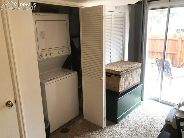 a utility room with washer and dryer