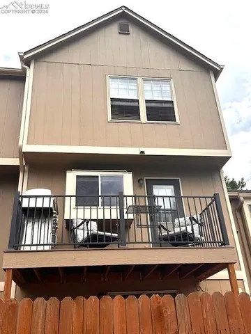 a front view of a house with balcony