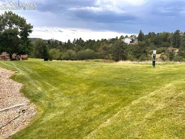 a view of an ocean and a mountain