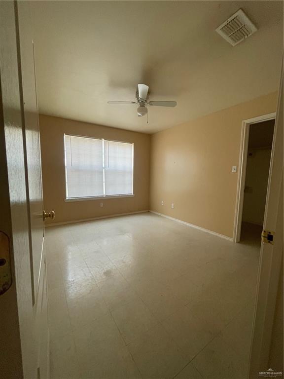 1006 Lilia Drive, Unit 73 Weslaco, TX 78599 - Photo 7 of 10 a view of an empty room with a window