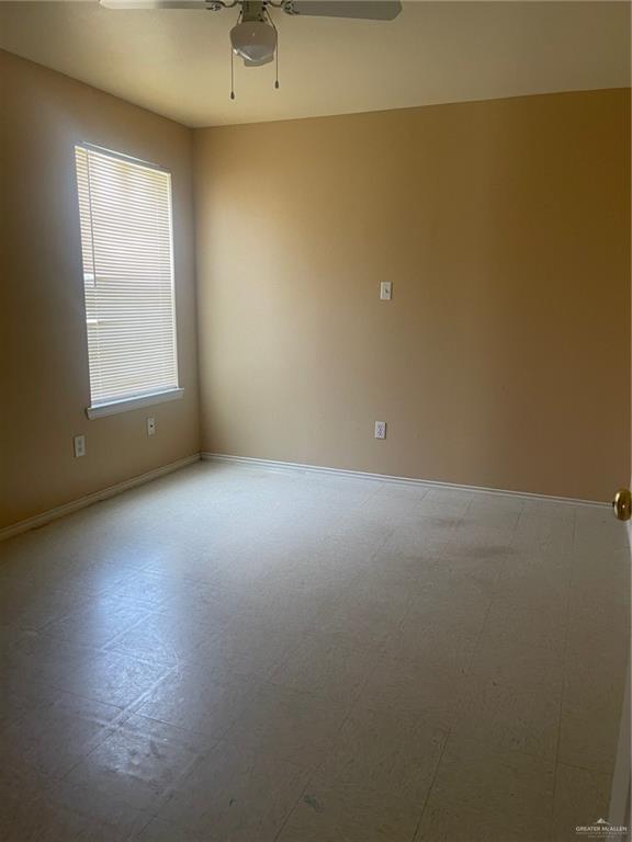 1006 Lilia Drive, Unit 73 Weslaco, TX 78599 - Photo 9 of 10 an empty room with windows